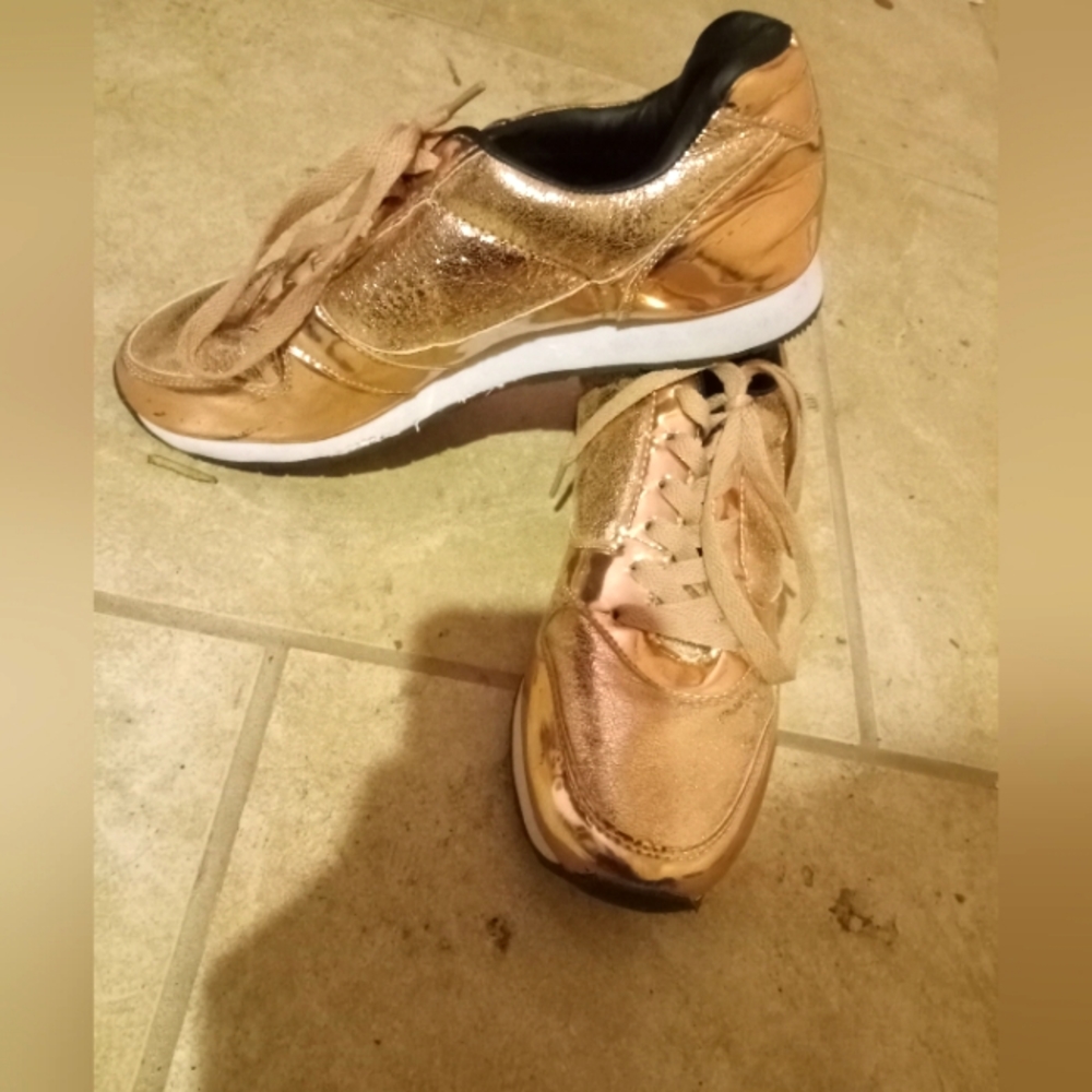 These are rose gold sneakers and a beautiful touch to any wardrobe